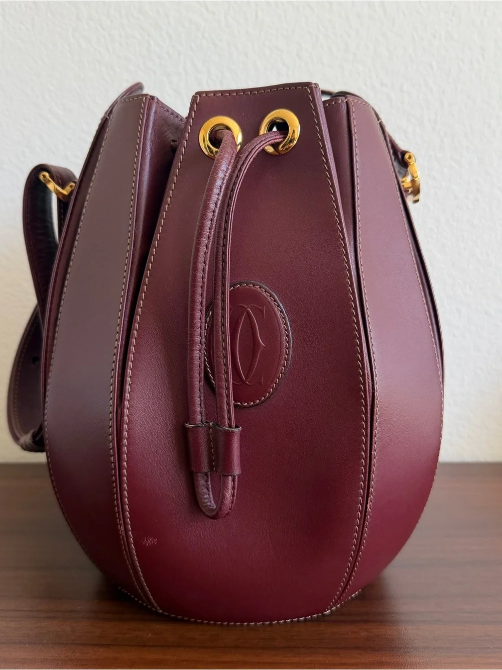 Leather Cartier Drawstring Bucket Bag in Deep Burgundy